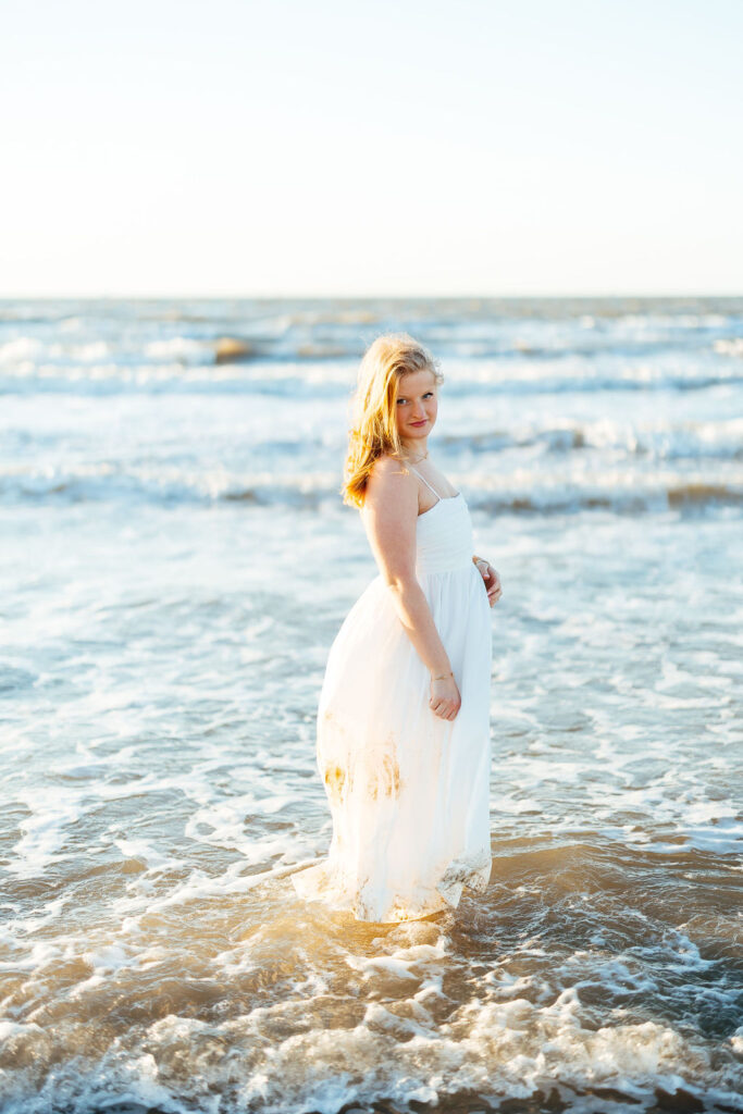 photos of girl during photoshoot in texas on the beach