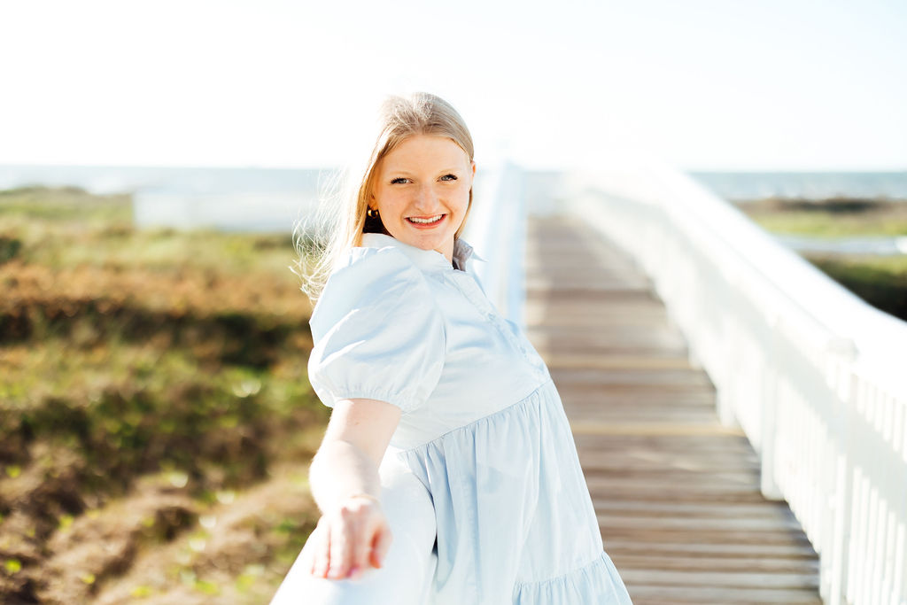 photos of girl during photoshoot in texas on a pier 