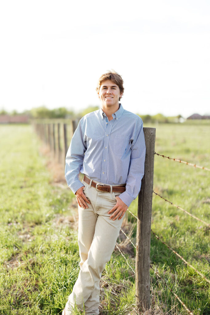 guy during open field senior session