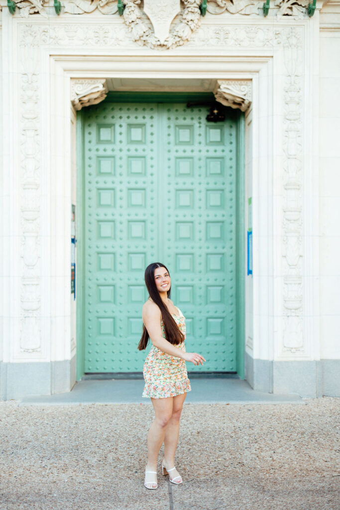 girl taking photos for college graduation 